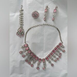 Elegant pink Jewelry set with Tikka and ring